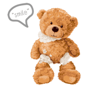 Urso de pelúcia sorridente com pelagem marrom e detalhes em branco, acompanhado pela fala "smile". Ideal para transmitir alegria e conforto.